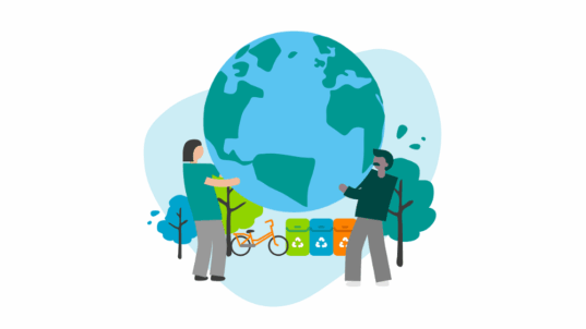 Kaksi ihmistä kannattelee maapalloa.